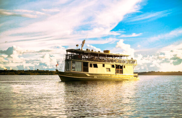 Sunset on the river during a Manakin Riverboat expedition