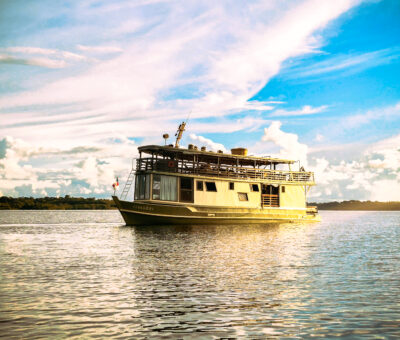 Sunset on the river during a Manakin Riverboat expedition